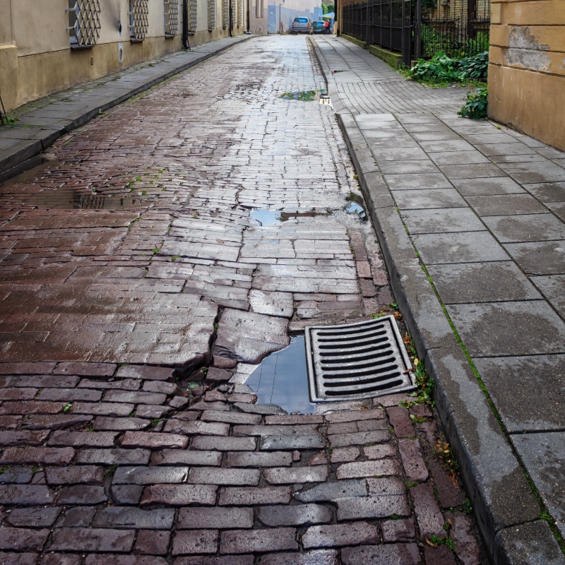 old street of the historic center of Vilnius after rain